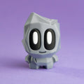 Figura “Rock Buddy Basalto” — Mini Coleccionable de Roca Gris