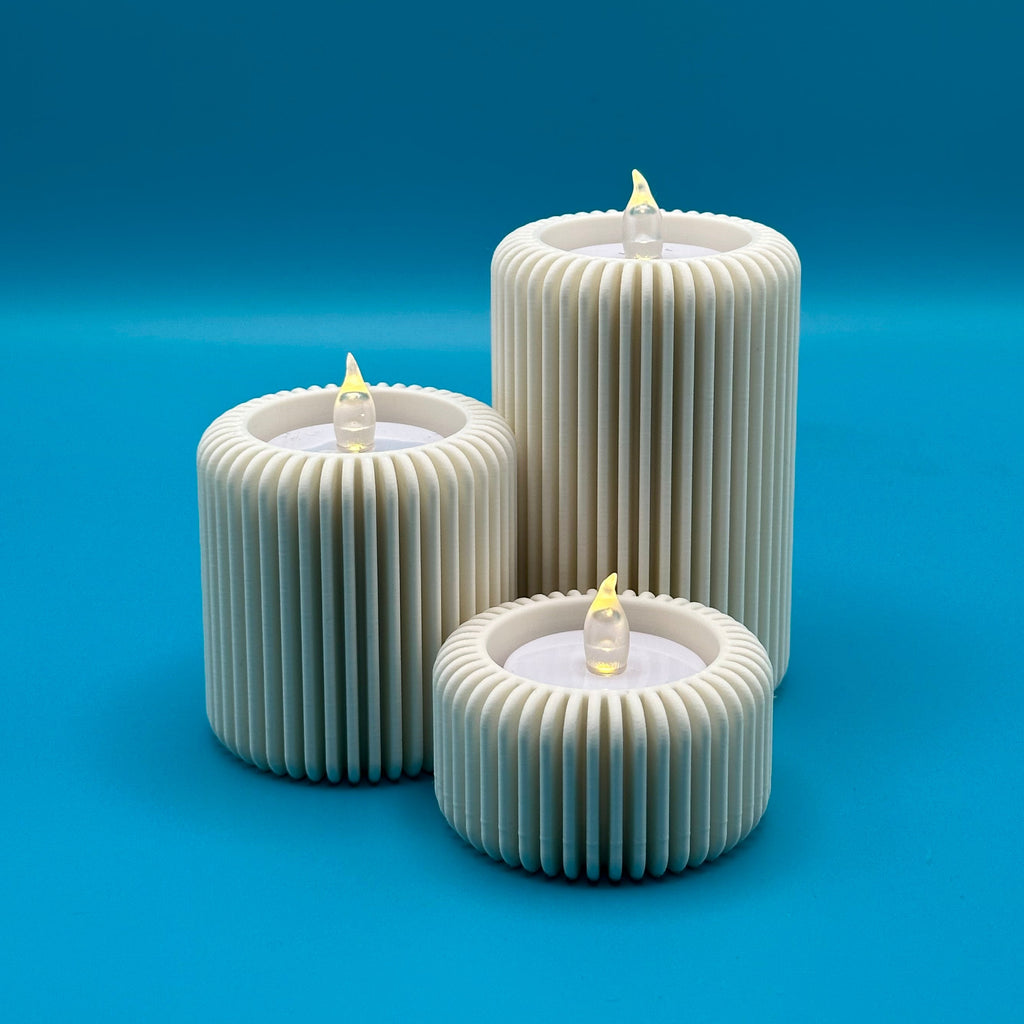 Conjunto de tres portavelas modelo Fins 1 con diseño minimalista y elegante