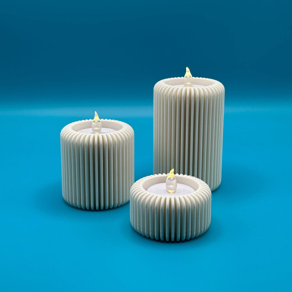 Conjunto de tres portavelas modelo Fins 1 con diseño minimalista y elegante